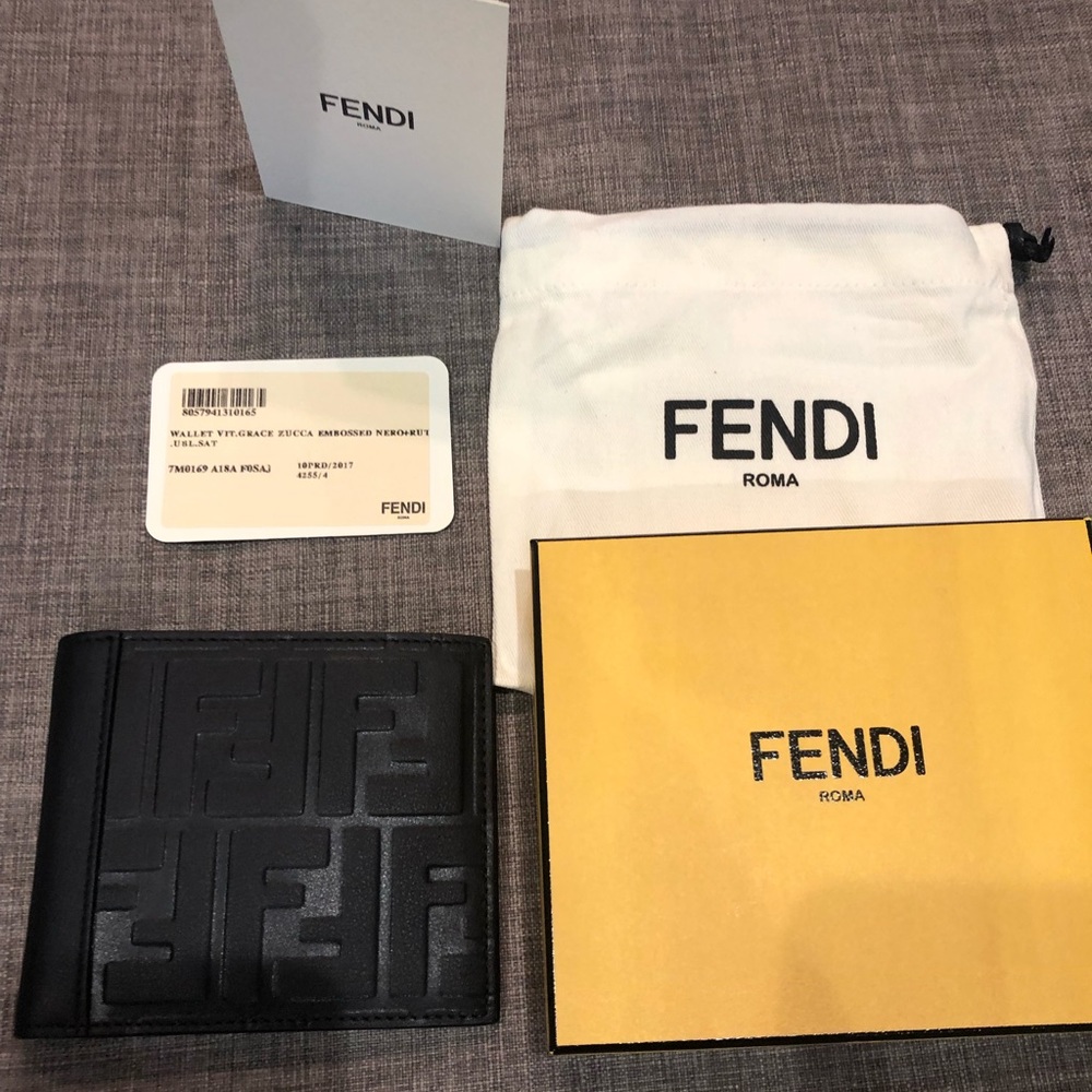 Logo embossed bi-fold wallet - Never Used